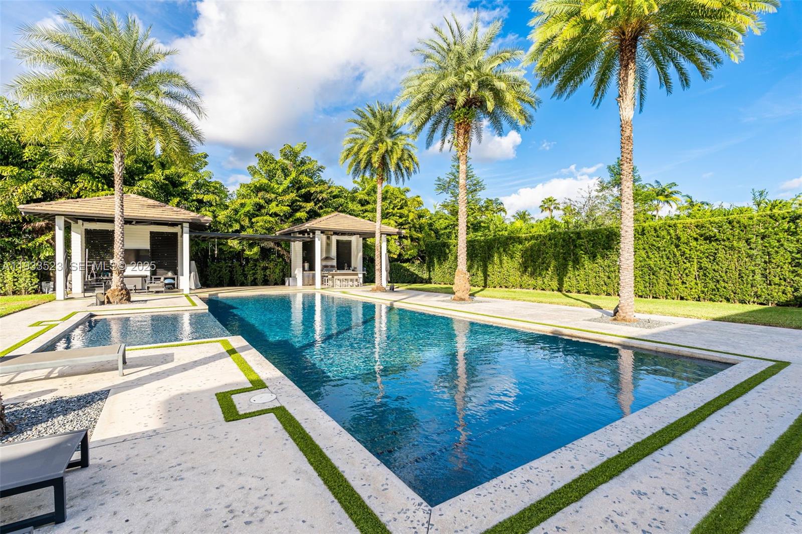 8271 Southwest 67th Street Miami, FL 33143 - Photo 10 of 88 a view of swimming pool with a table and chairs
