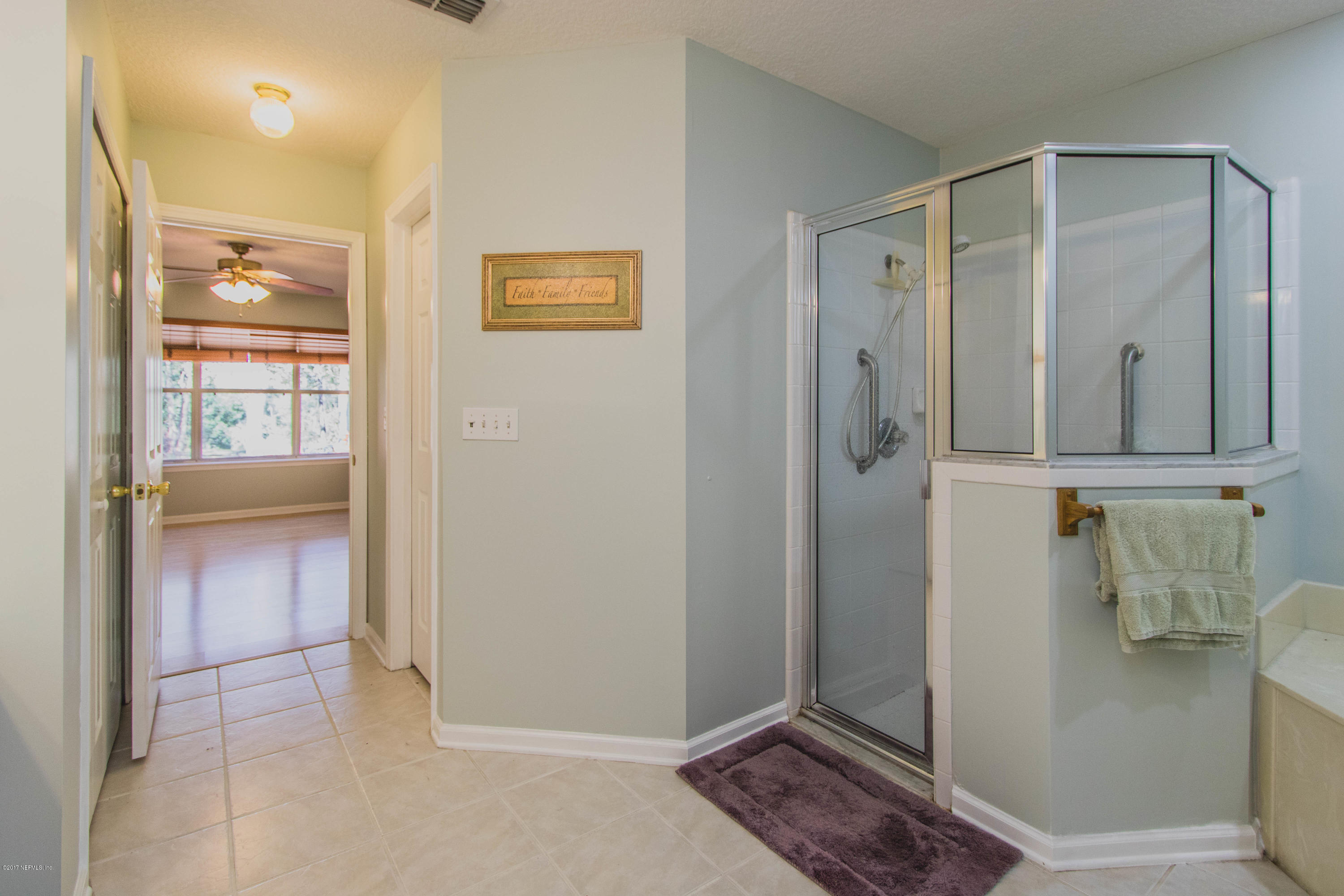 3123 Ravines Road Middleburg, FL 32068 - Photo 16 of 32 a view of walk in closet