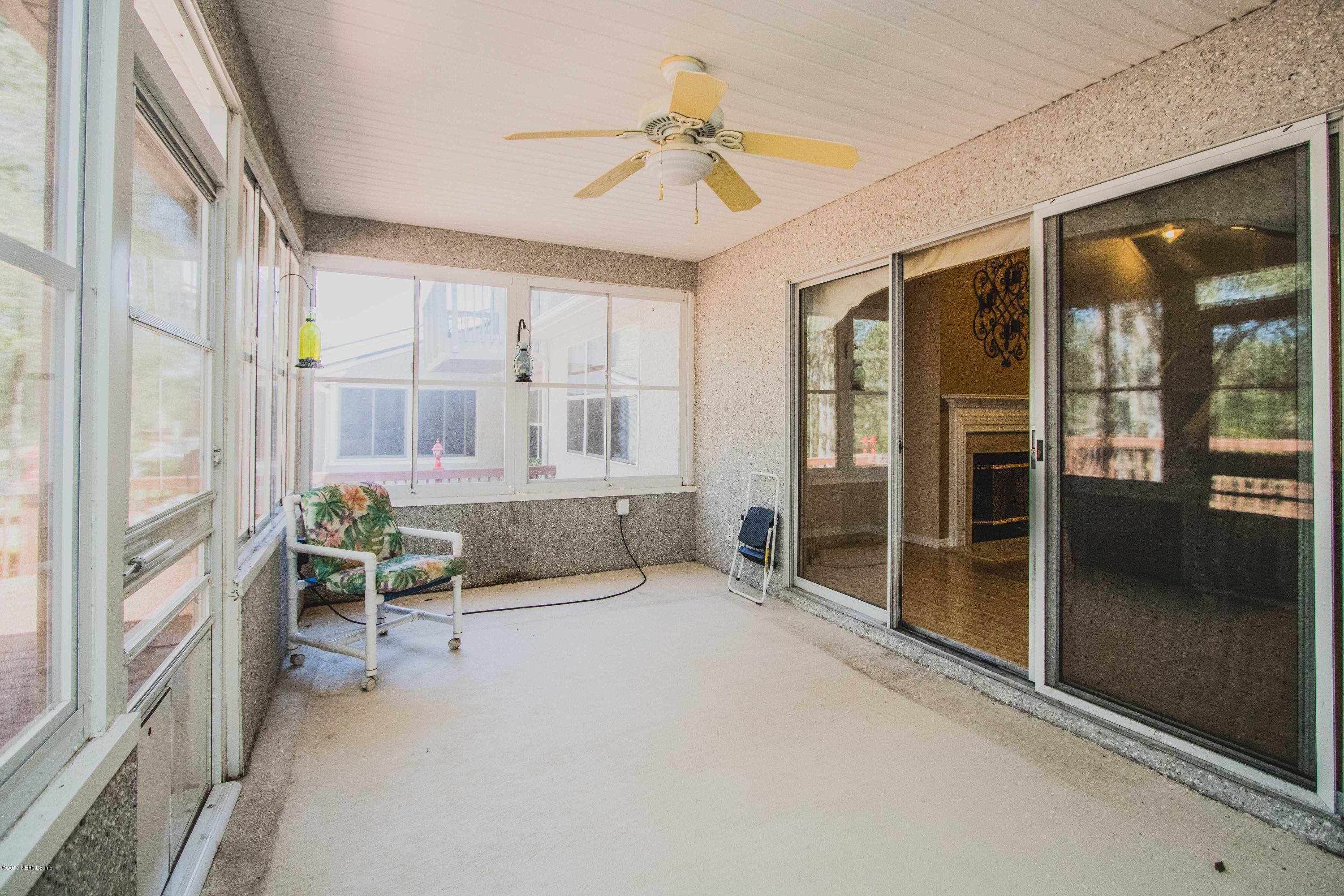 3123 Ravines Road Middleburg, FL 32068 - Photo 26 of 32 a living room with furniture