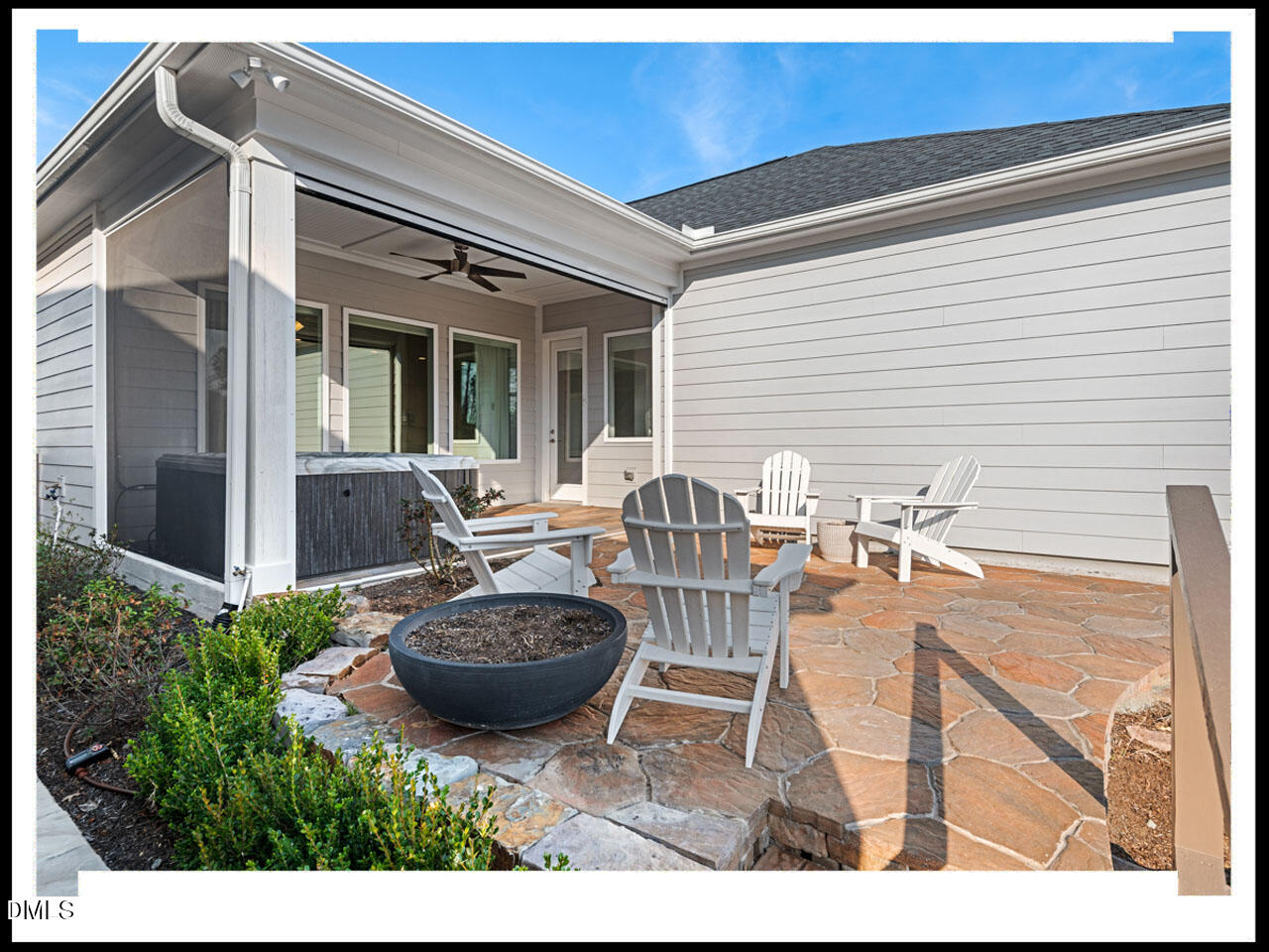 153 Abercorn Circle Chapel Hill, NC 27516 - Photo 38 of 51 a view of a patio with table and chairs and potted plants