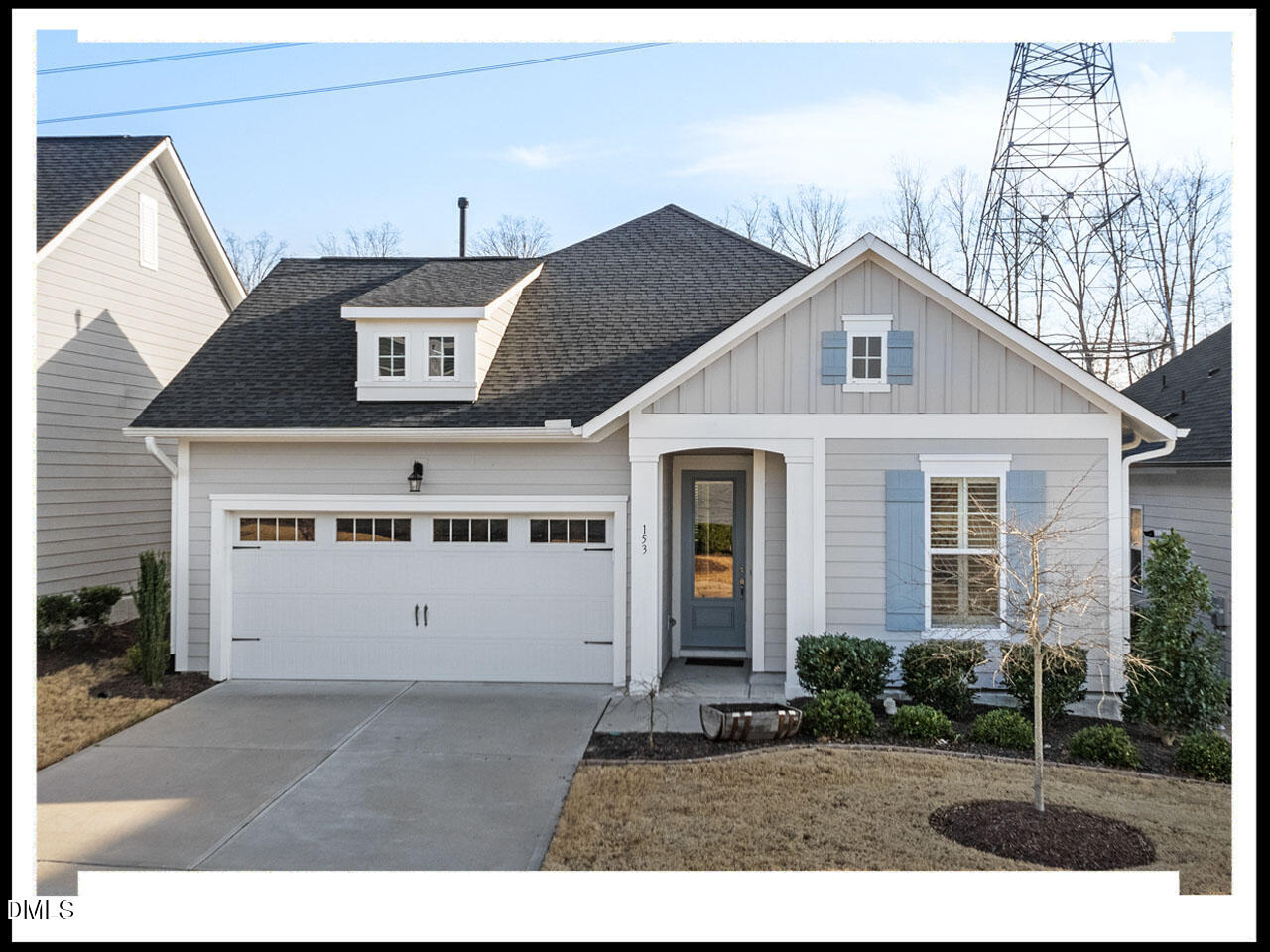 153 Abercorn Circle Chapel Hill, NC 27516 - Photo 42 of 51 a front view of a house with a yard and garage