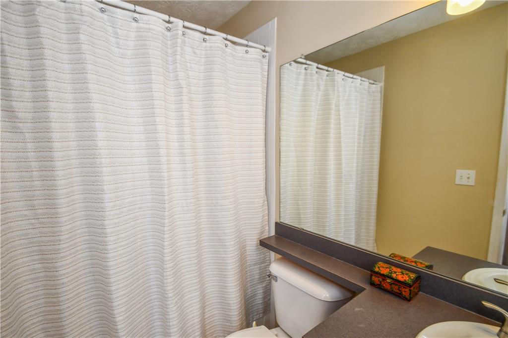 1609 Indian Way Cumming, GA 30040 - Photo 54 of 72 a view of a room with a white wall and a window