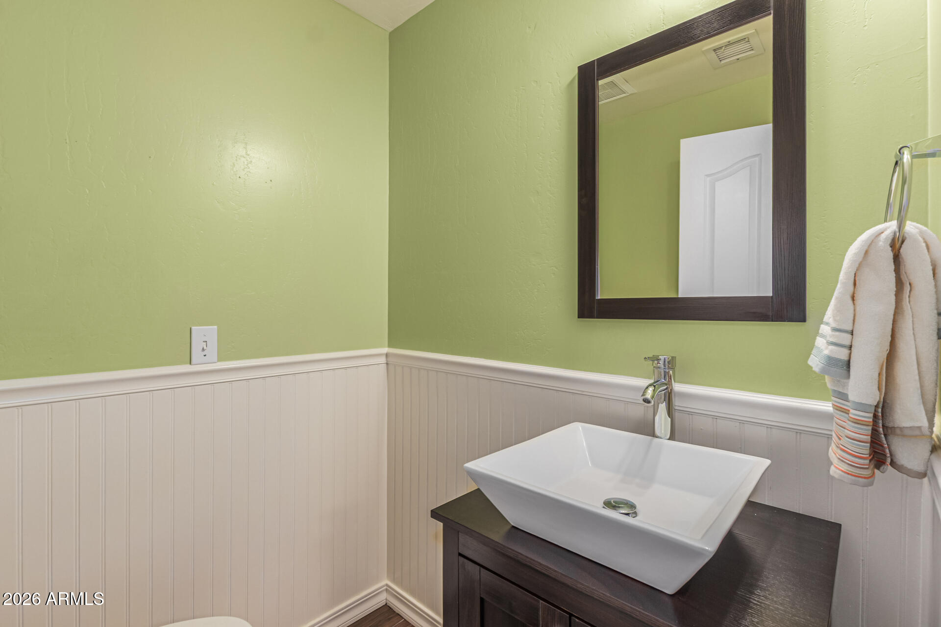 5445 East McKellips Road, Unit 25 Mesa, AZ 85215 - Photo 13 of 32 a bathroom with a sink and a mirror