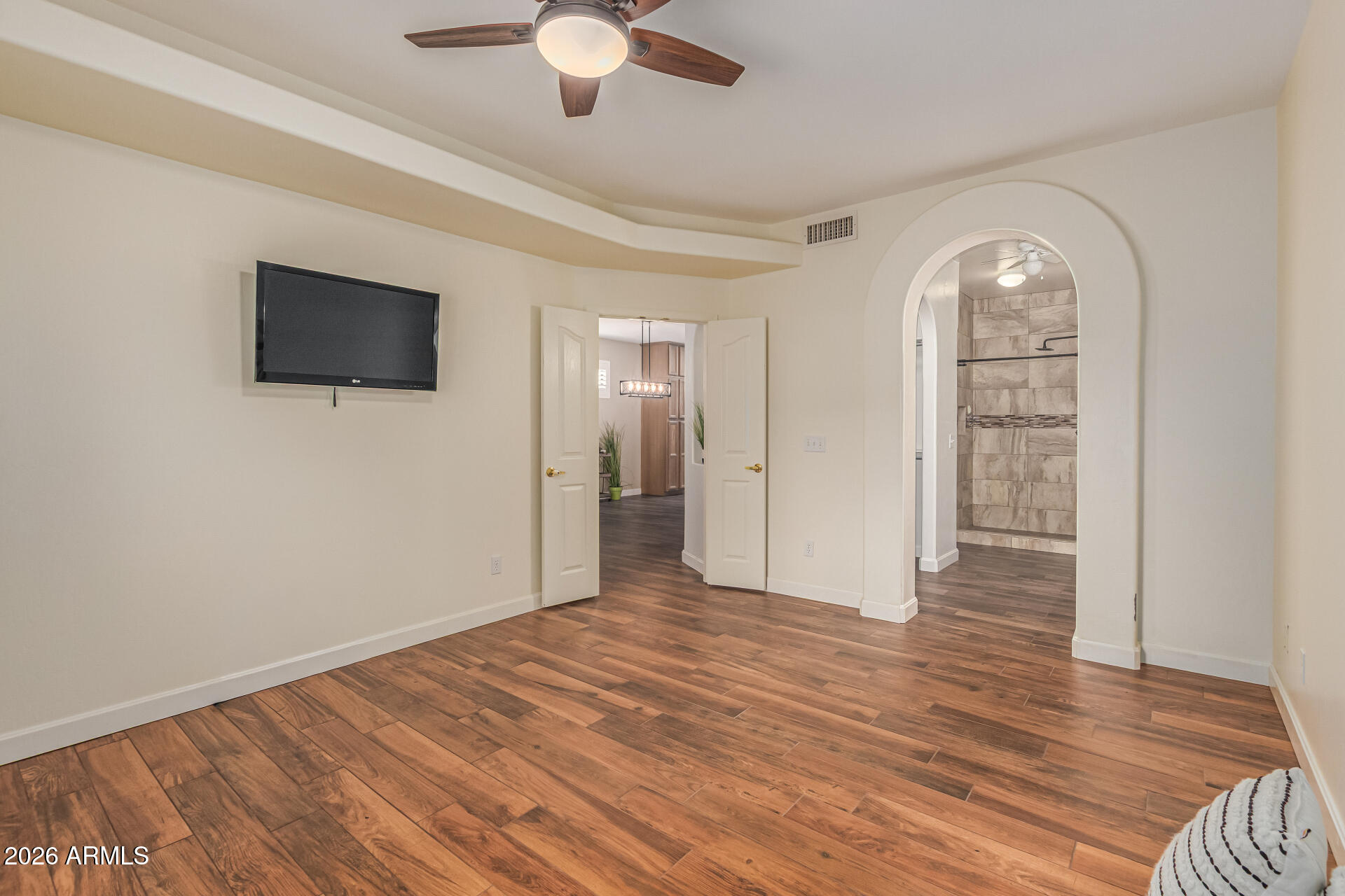 5445 East McKellips Road, Unit 25 Mesa, AZ 85215 - Photo 14 of 32 wooden floor in an empty room with a window