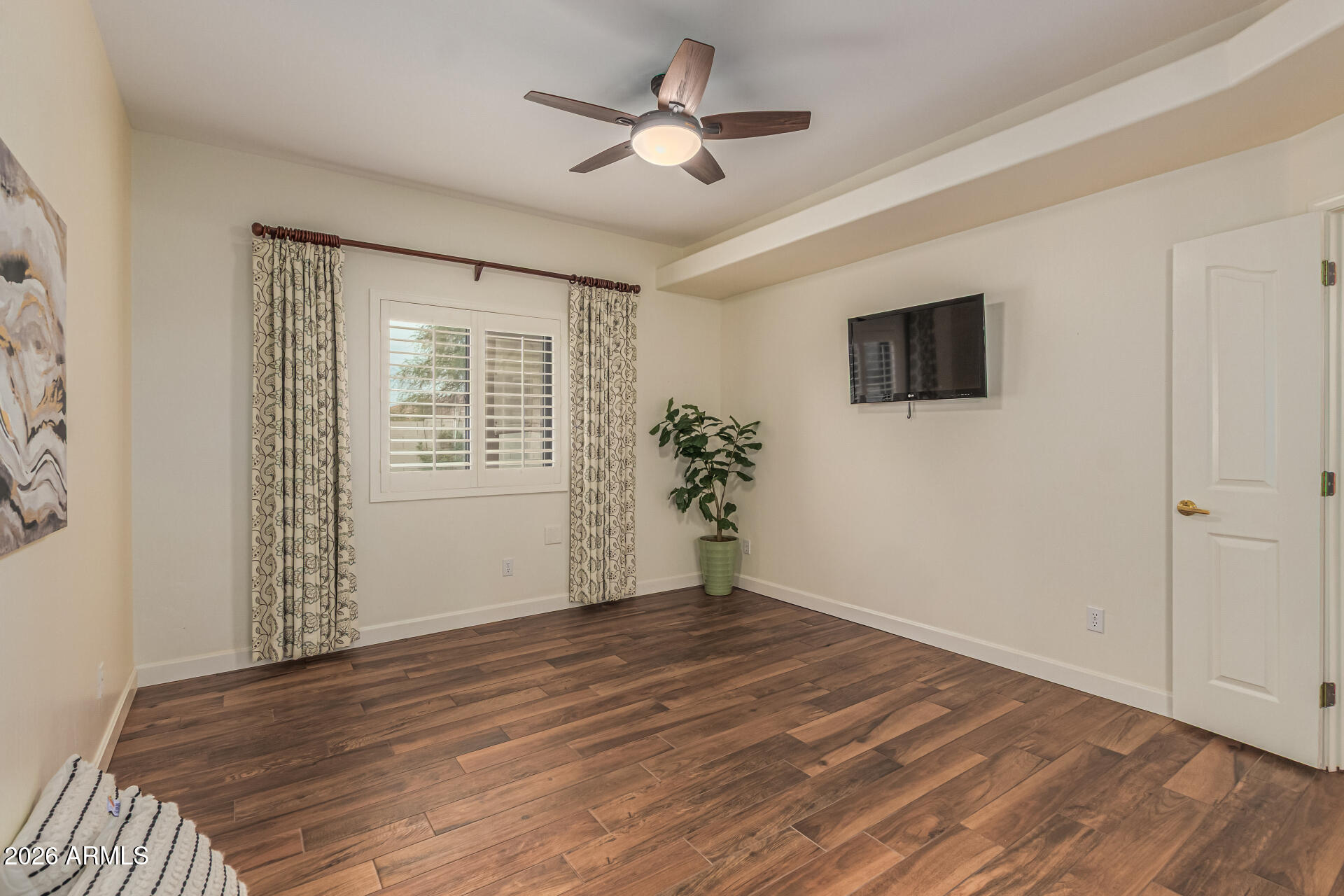 5445 East McKellips Road, Unit 25 Mesa, AZ 85215 - Photo 16 of 32 a view of a livingroom with a flat screen tv
