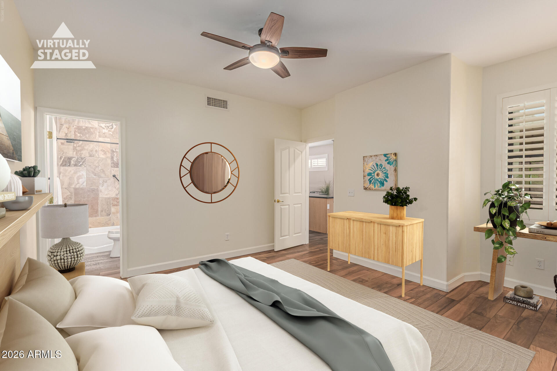 5445 East McKellips Road, Unit 25 Mesa, AZ 85215 - Photo 19 of 32 a bedroom with a bed and a chandelier