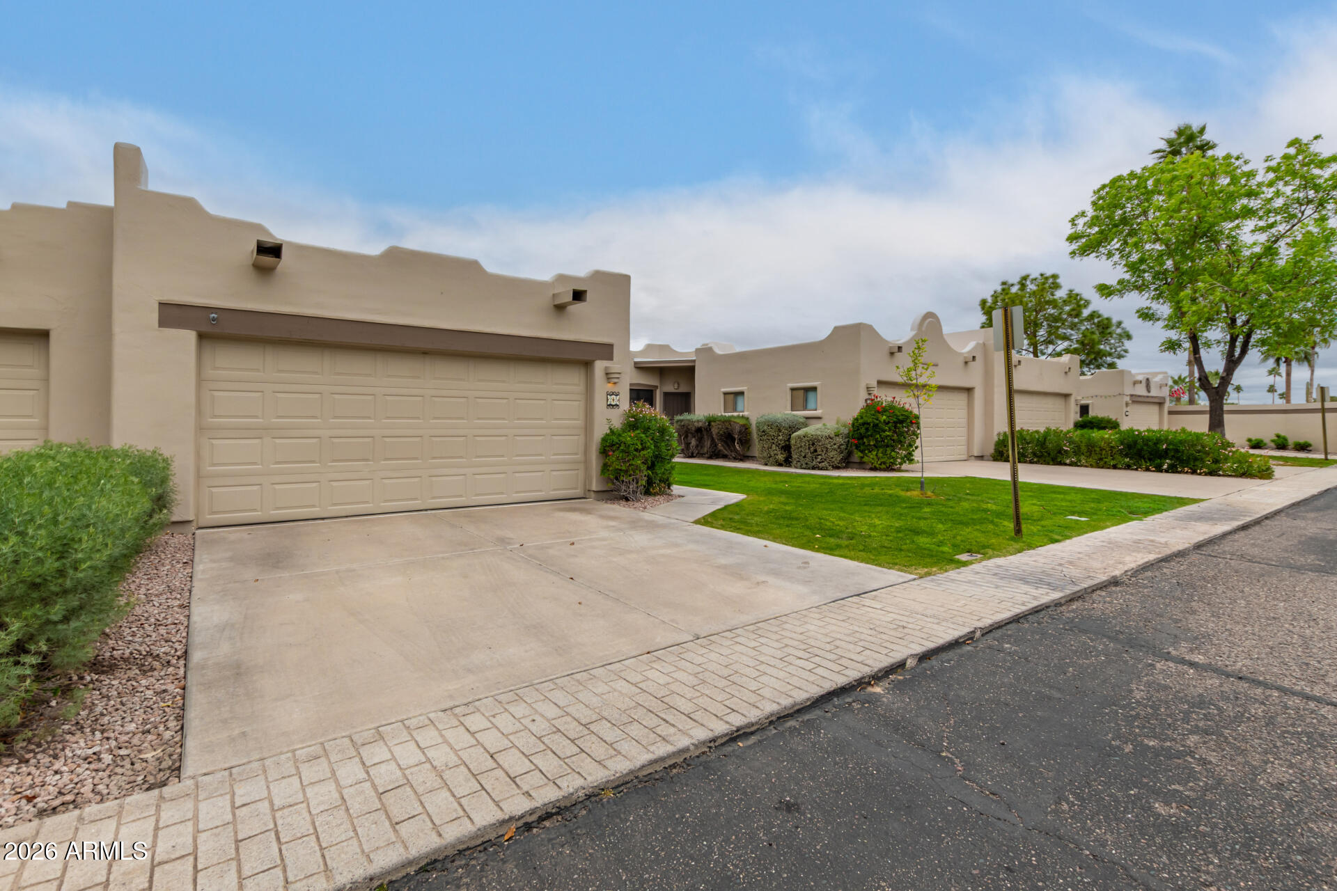 5445 East McKellips Road, Unit 25 Mesa, AZ 85215 - Photo 2 of 32 a view of backyard and entertaining space