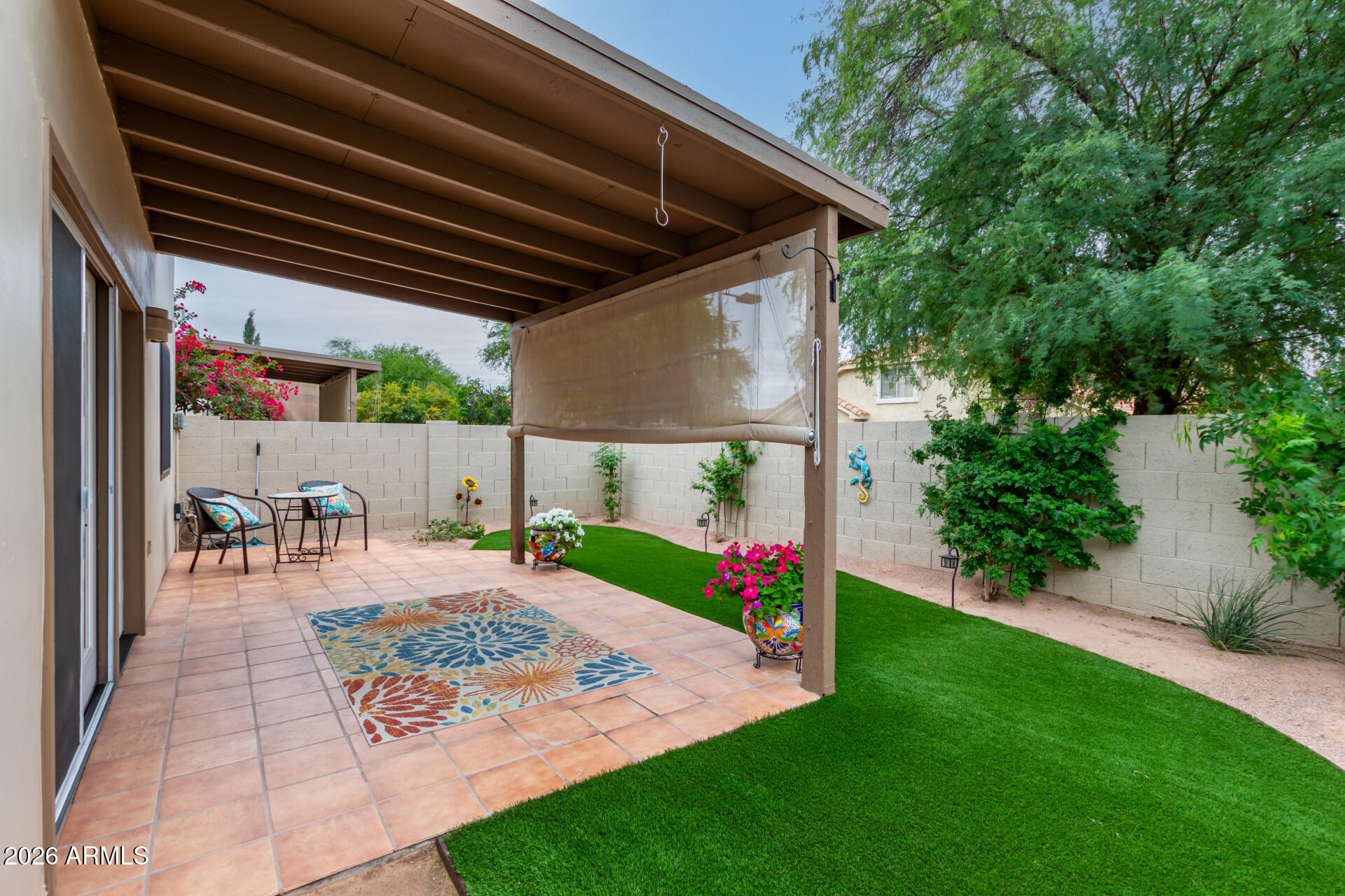5445 East McKellips Road, Unit 25 Mesa, AZ 85215 - Photo 24 of 32 a view of yard with patio