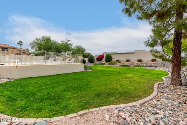 a view of a golf course with a garden