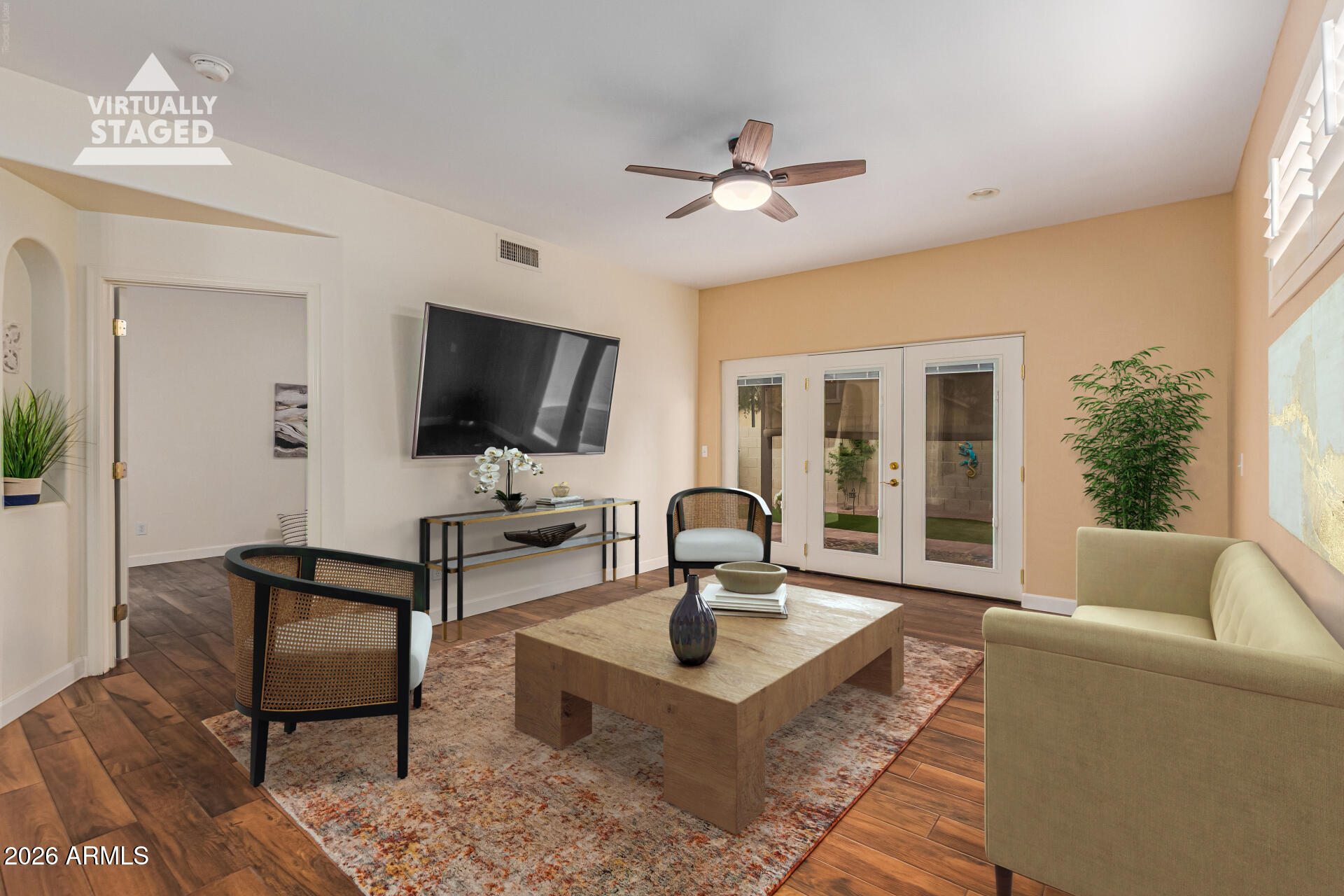 5445 East McKellips Road, Unit 25 Mesa, AZ 85215 - Photo 5 of 32 a living room with furniture and a flat screen tv