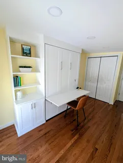 a workspace with wooden floor