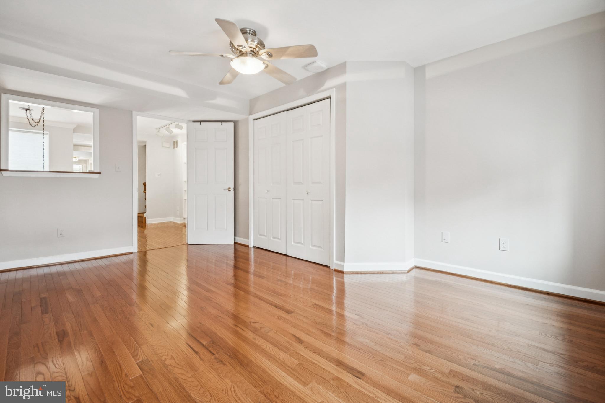 1134 Battery Avenue Baltimore, MD 21230 - Photo 18 of 30 a view of an empty room with wooden floor