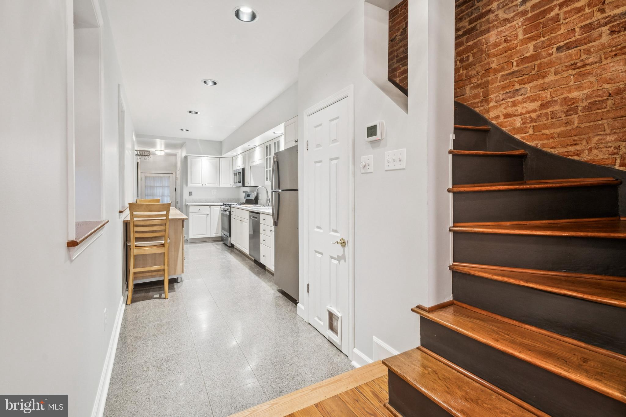 1134 Battery Avenue Baltimore, MD 21230 - Photo 4 of 30 a view of kitchen with furniture and a refrigerator