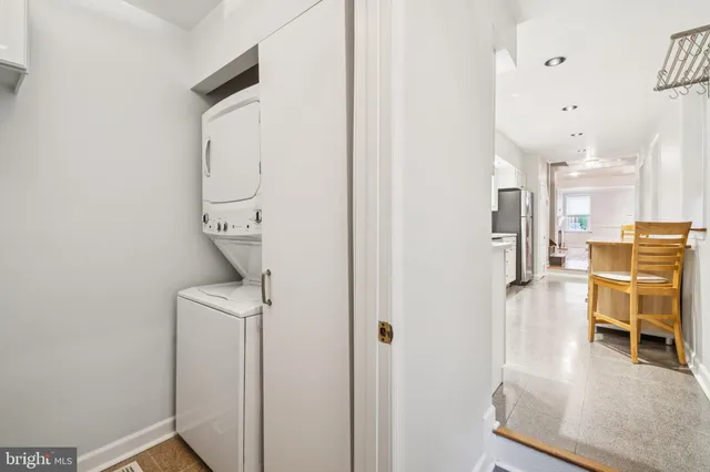 a view of a kitchen from the hallway