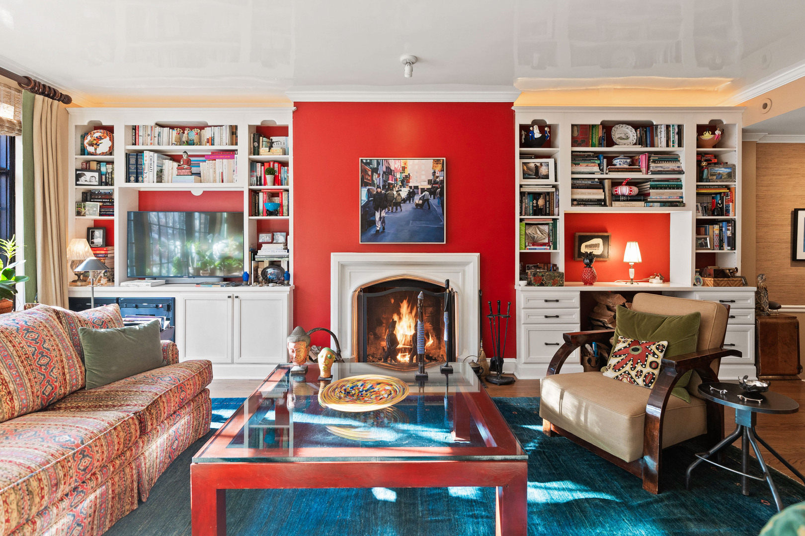 26 East Scott Street, Unit 3 Chicago, IL 60610 - Photo 12 of 35 a living room with furniture a fireplace and a large window