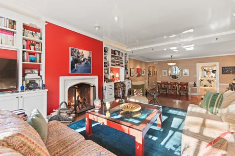 a view of a kitchen with stainless steel appliances granite countertop a sink and a stove