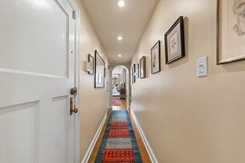 a bedroom with a bed and dresser