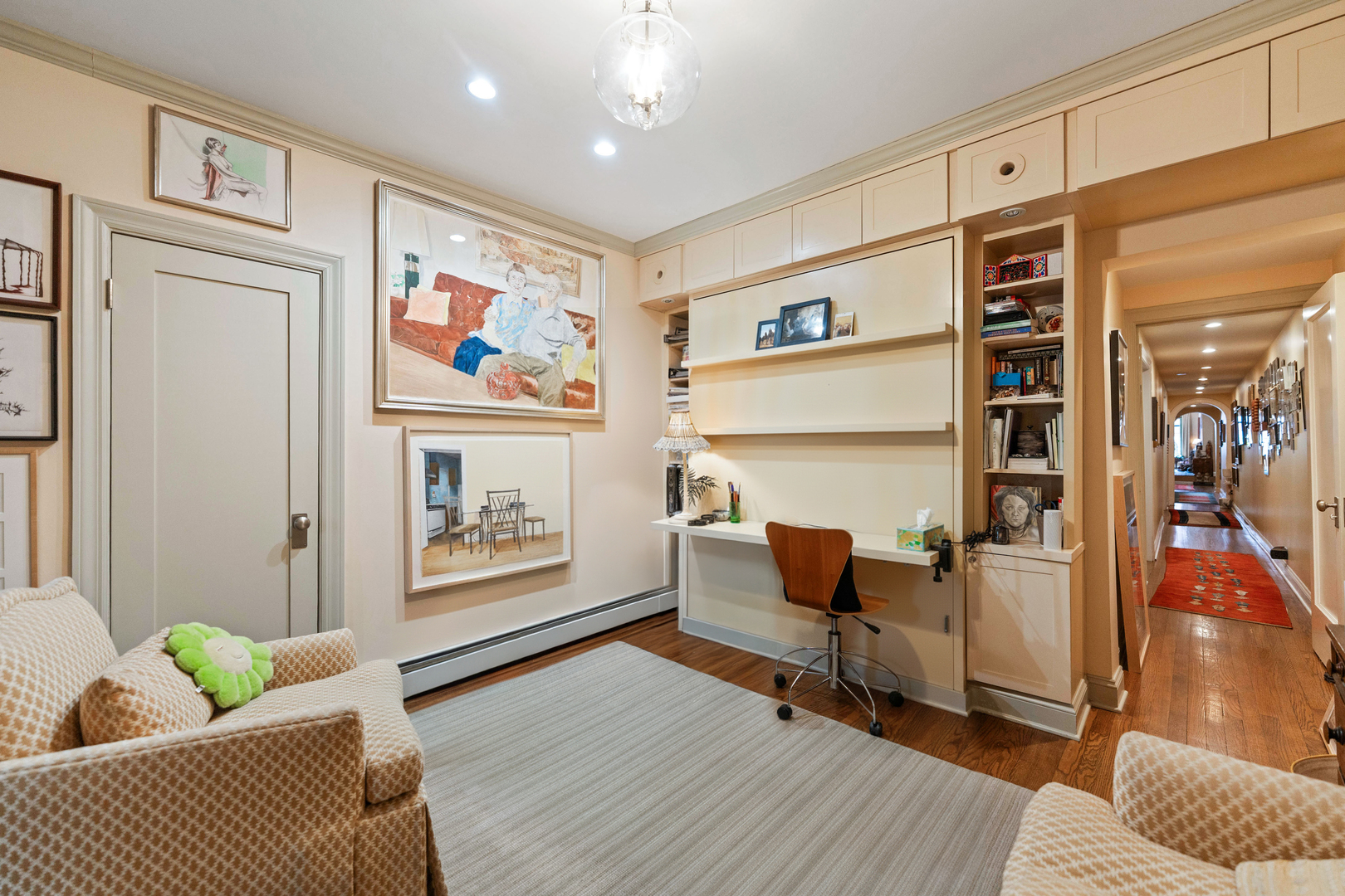 26 East Scott Street, Unit 3 Chicago, IL 60610 - Photo 28 of 35 a living room with furniture and wooden floor