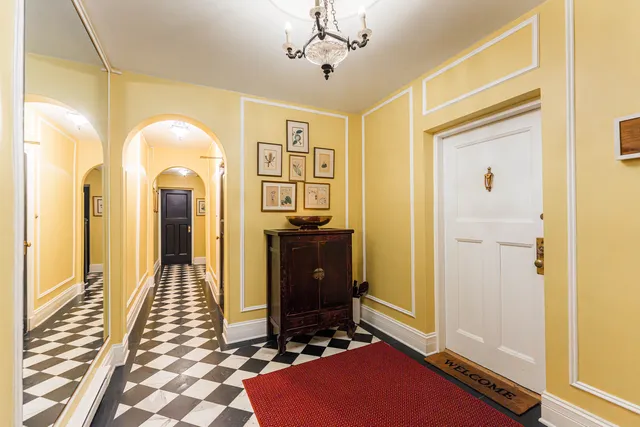 a view of a livingroom with furniture and a window