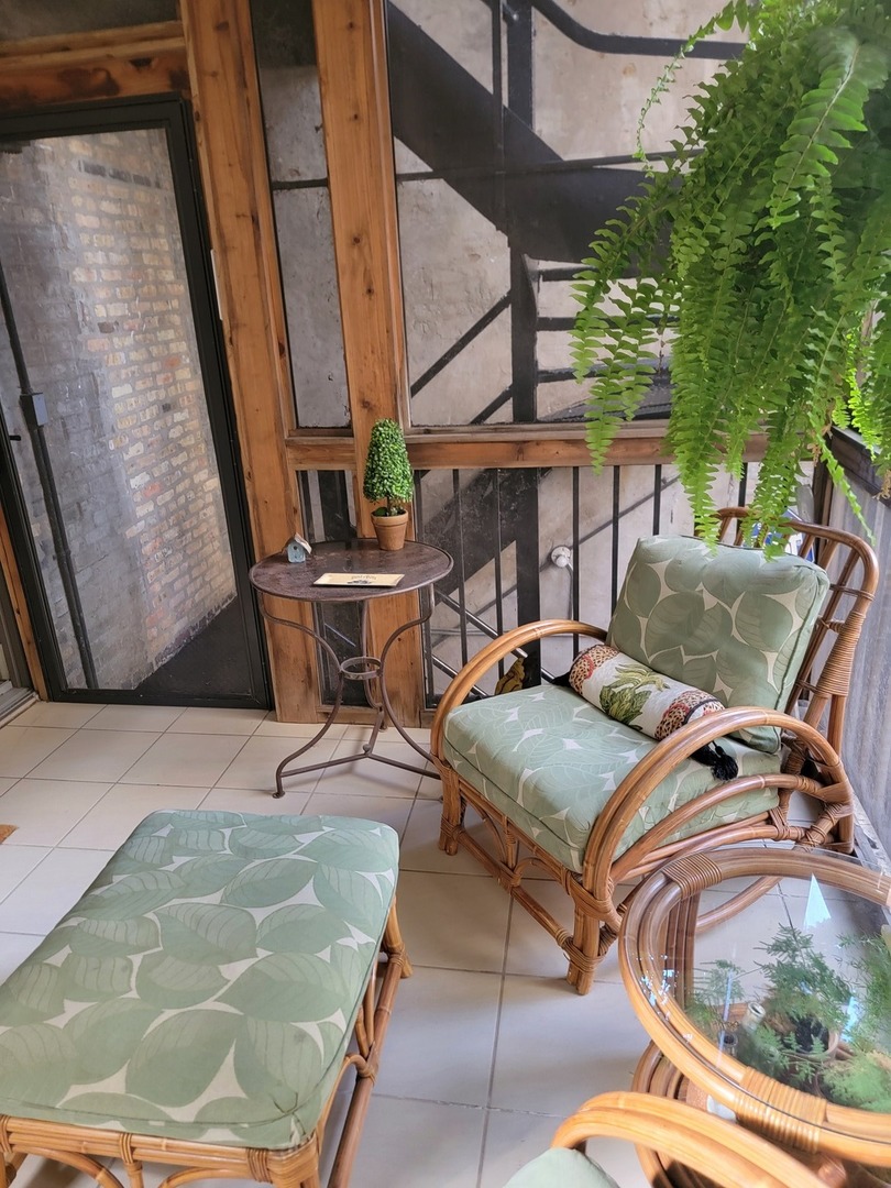 26 East Scott Street, Unit 3 Chicago, IL 60610 - Photo 34 of 35 a view of outdoor kitchen with seating area