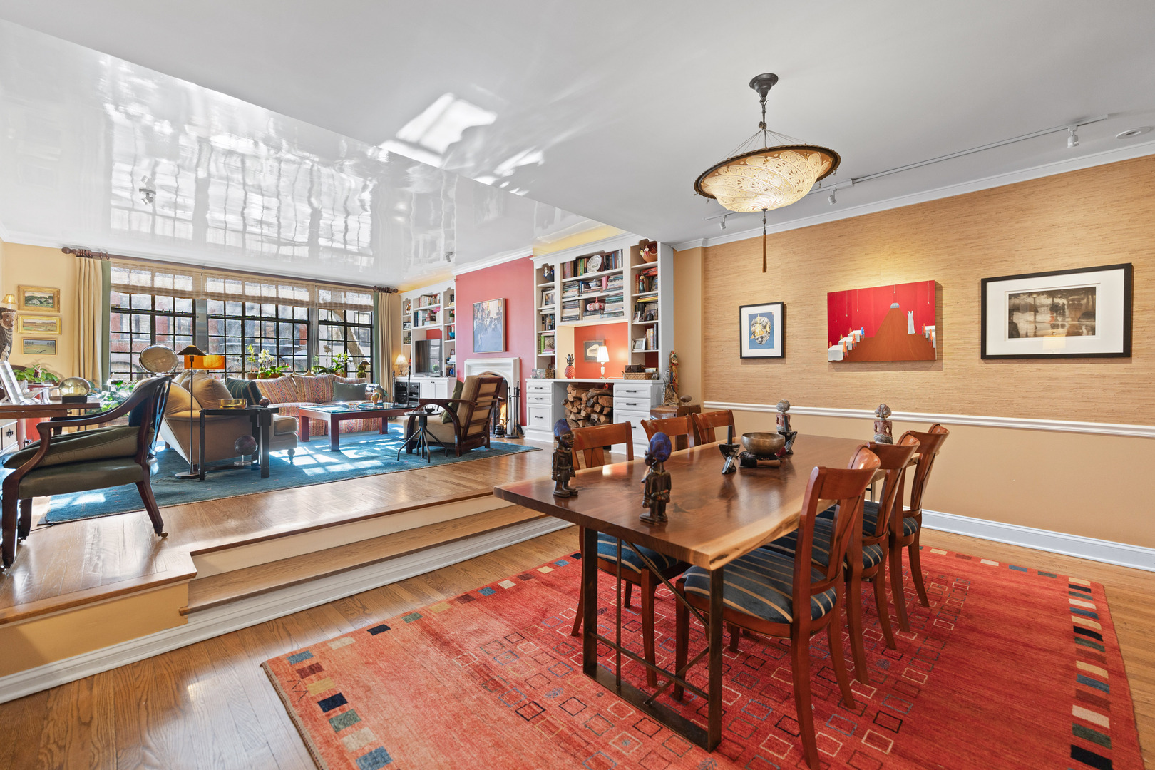 26 East Scott Street, Unit 3 Chicago, IL 60610 - Photo 5 of 35 a view of a dining room with furniture wooden floor and chandelier