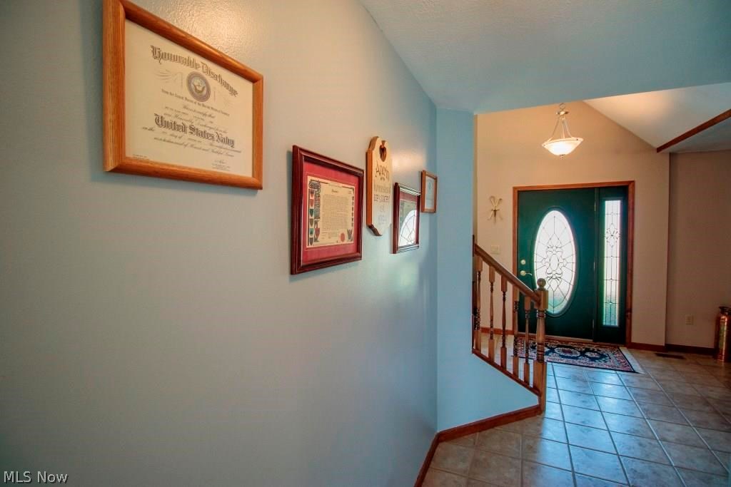 5067 Ayers Road Andover, OH 44003 - Photo 3 of 19 ... with ceramic flooring and access to half bath.