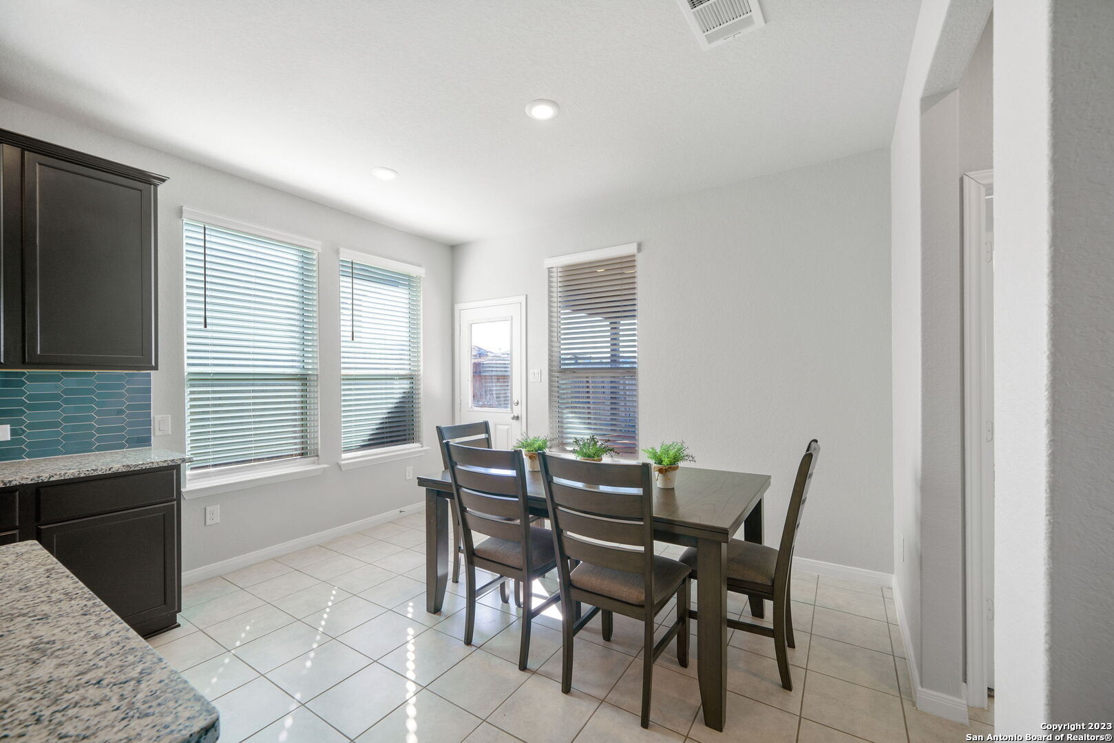5151 Longhorn River Converse, TX 78109 - Photo 10 of 25 a view of a dining room with furniture and window