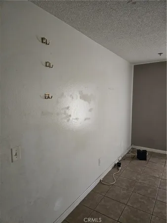a room with water heater and appliances