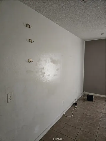 a room with water heater and appliances