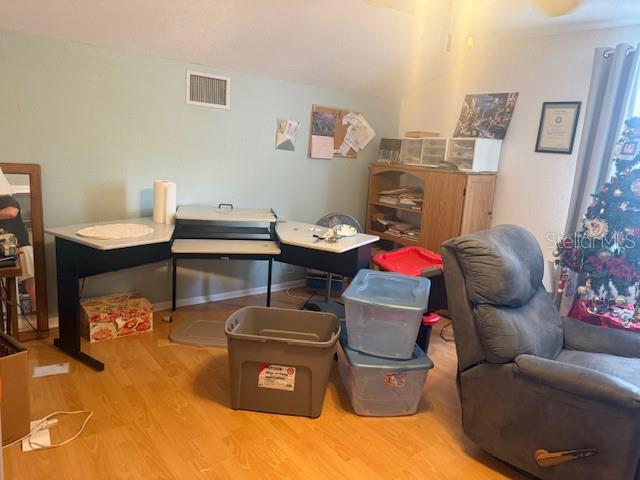 13157 Clay Avenue Largo, FL 33773 - Photo 11 of 20 a living room with furniture and a couch