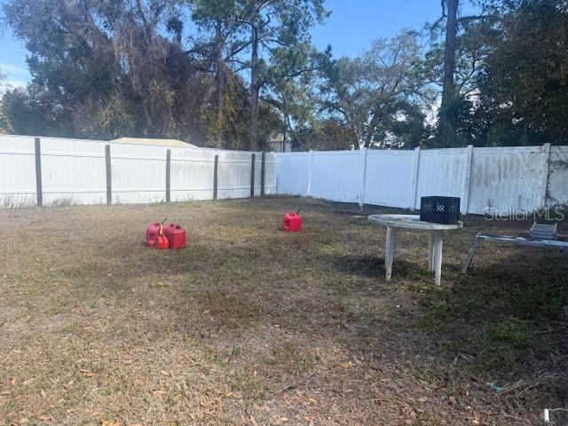 13157 Clay Avenue Largo, FL 33773 - Photo 19 of 20 a backyard view with sitting space
