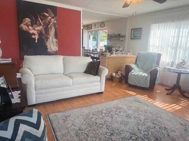 13157 Clay Avenue Largo, FL 33773 - Photo 3 of 20 a living room with furniture or couch and a large window