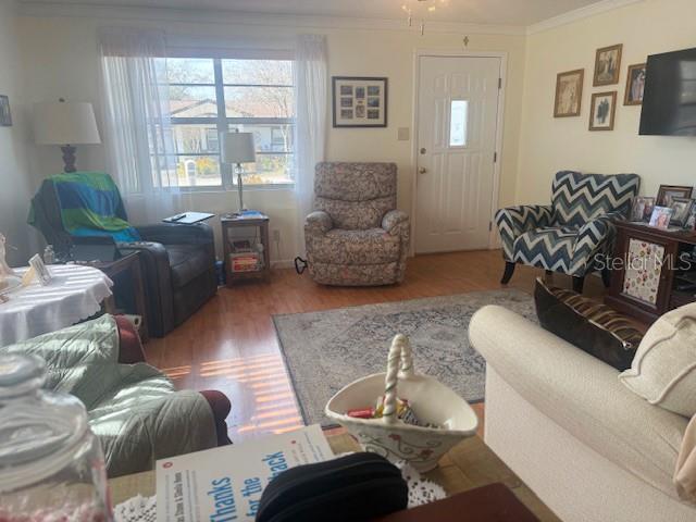 13157 Clay Avenue Largo, FL 33773 - Photo 4 of 20 a living room with furniture and a large window