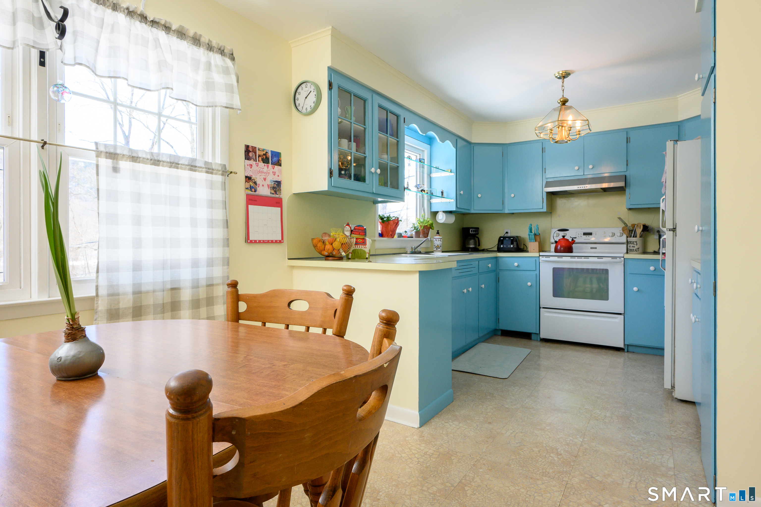 76 South Kent Road Kent, CT 06757 - Photo 5 of 20 a kitchen with a sink appliances and cabinets