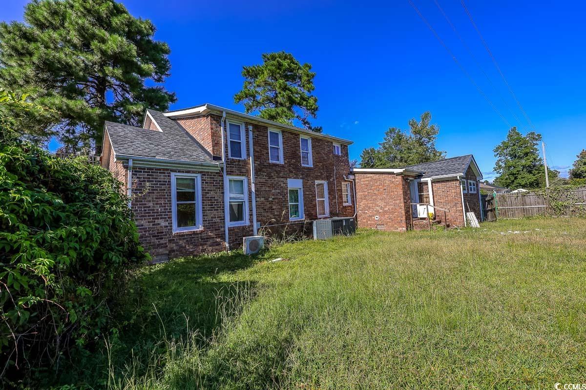4300 Summit Trail Myrtle Beach, SC 29579 - Photo 39 of 39 Back of property featuring brick siding and a shingled roof
