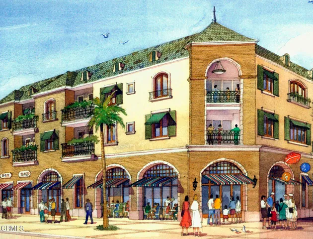 a front view of building with parking