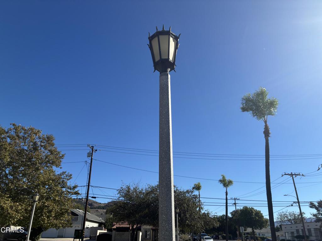 404 Central Avenue Fillmore, CA 93015 - Photo 7 of 16 a front view of a house with garden