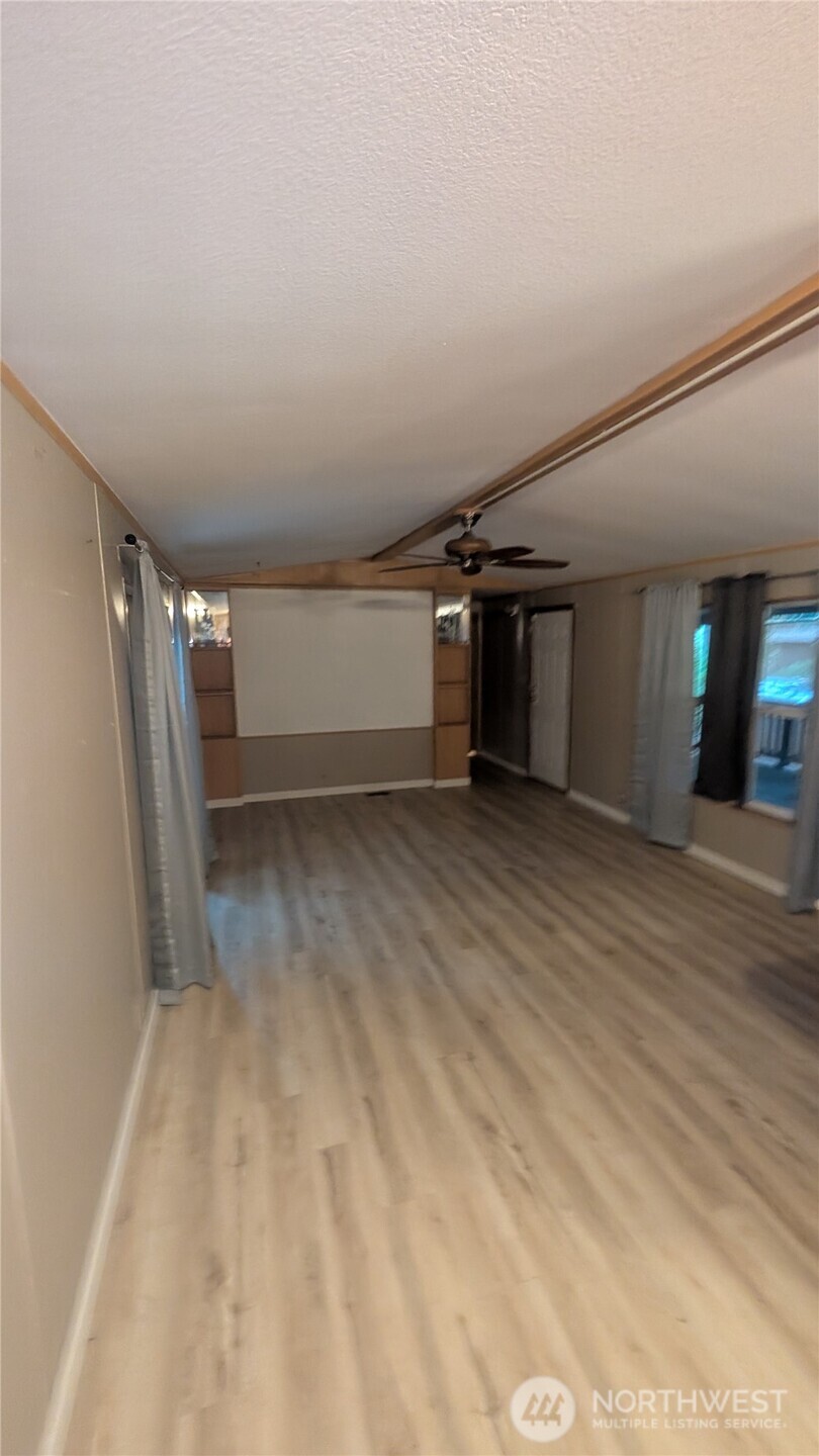 17340 Sargent Road Southwest, Unit 66 Rochester, WA 98579 - Photo 5 of 11 a view of an empty room