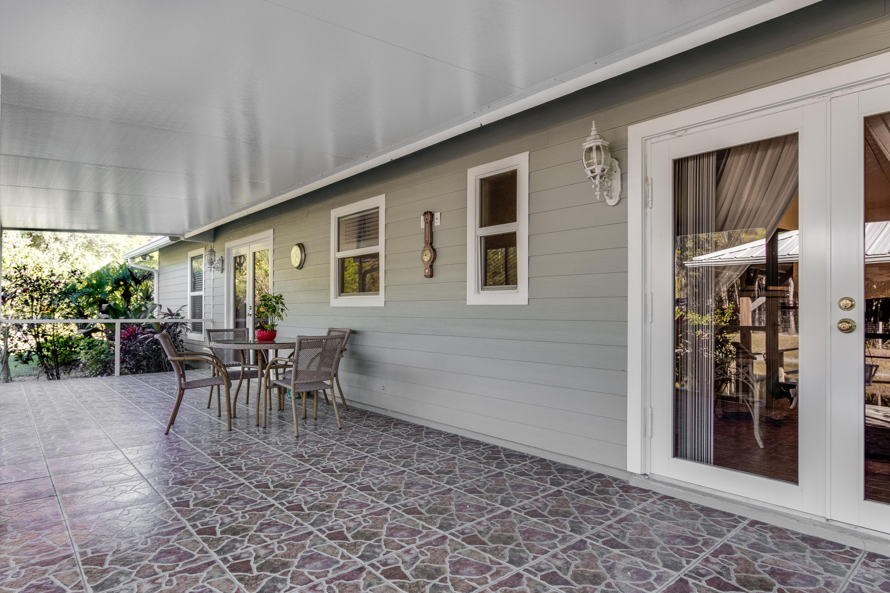 13281 165th Road North Jupiter, FL 33478 - Photo 18 of 28 Covered lanai