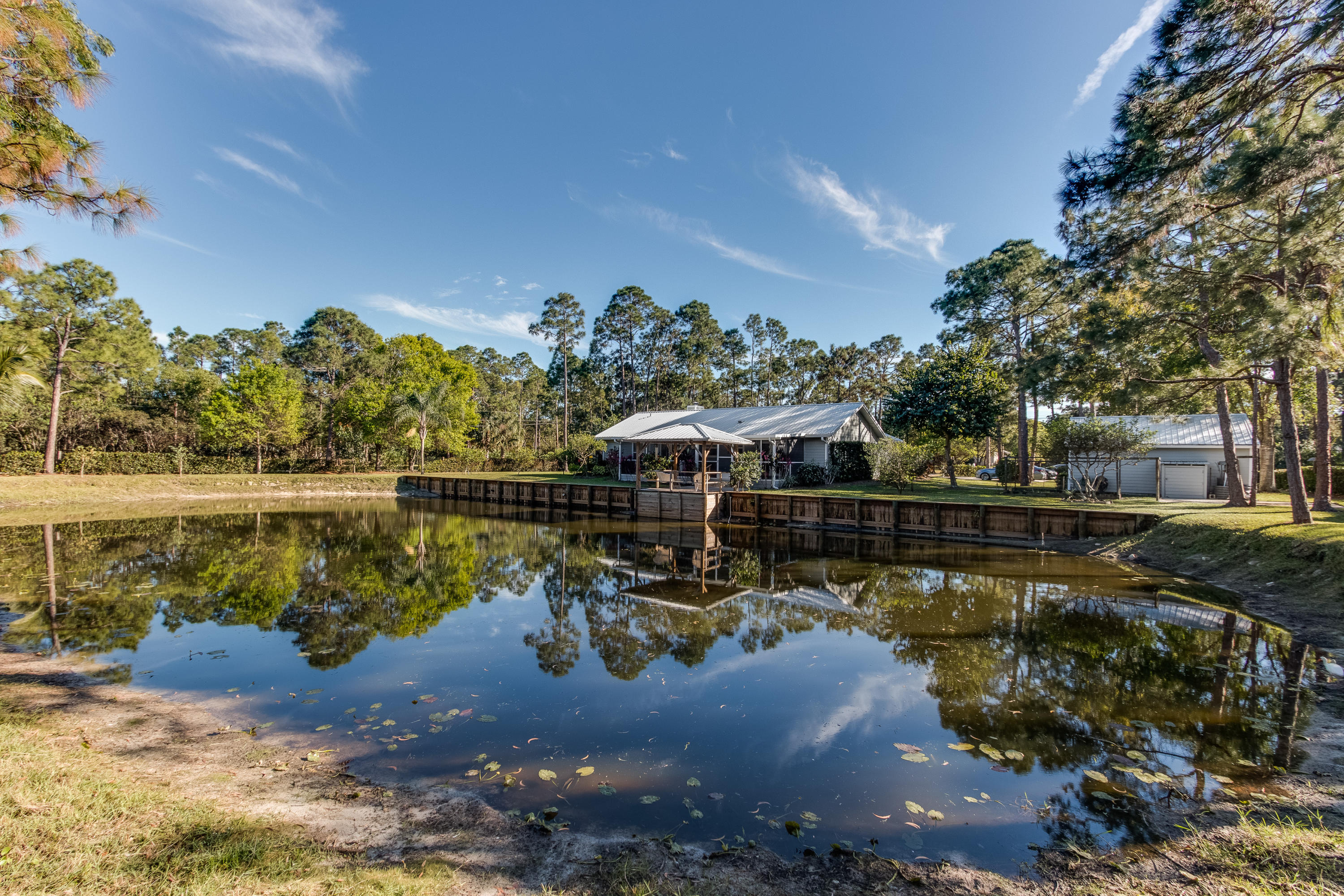 13281 165th Road North Jupiter, FL 33478 - Photo 27 of 28 Bulkheaded pond