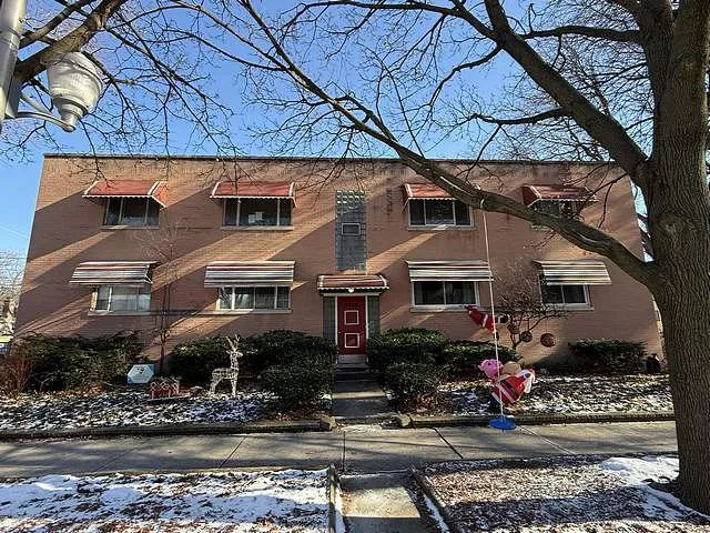 a house view with a garden space