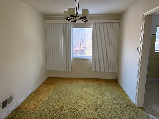 a kitchen with stainless steel appliances granite countertop a refrigerator a sink a stove a microwave and island