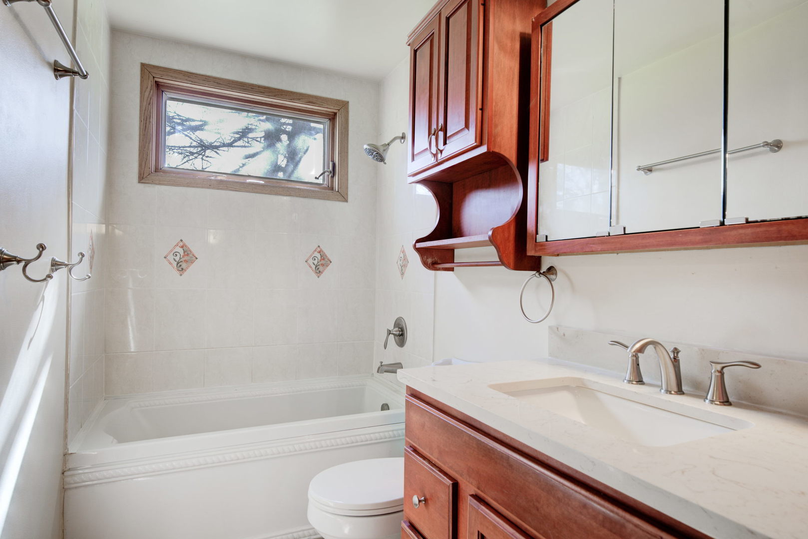 2317 High Ridge Parkway Hillside, IL 60162 - Photo 17 of 24 a bathroom with a granite countertop sink a toilet and bathtub