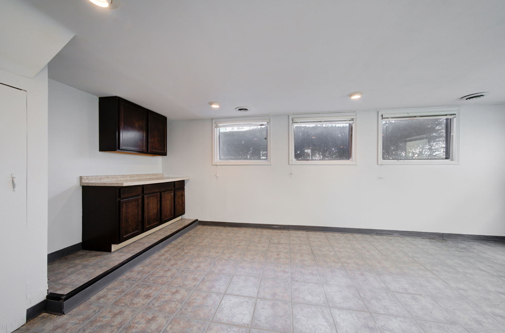 2317 High Ridge Parkway Hillside, IL 60162 - Photo 23 of 24 a living room with a flat screen tv and a fireplace
