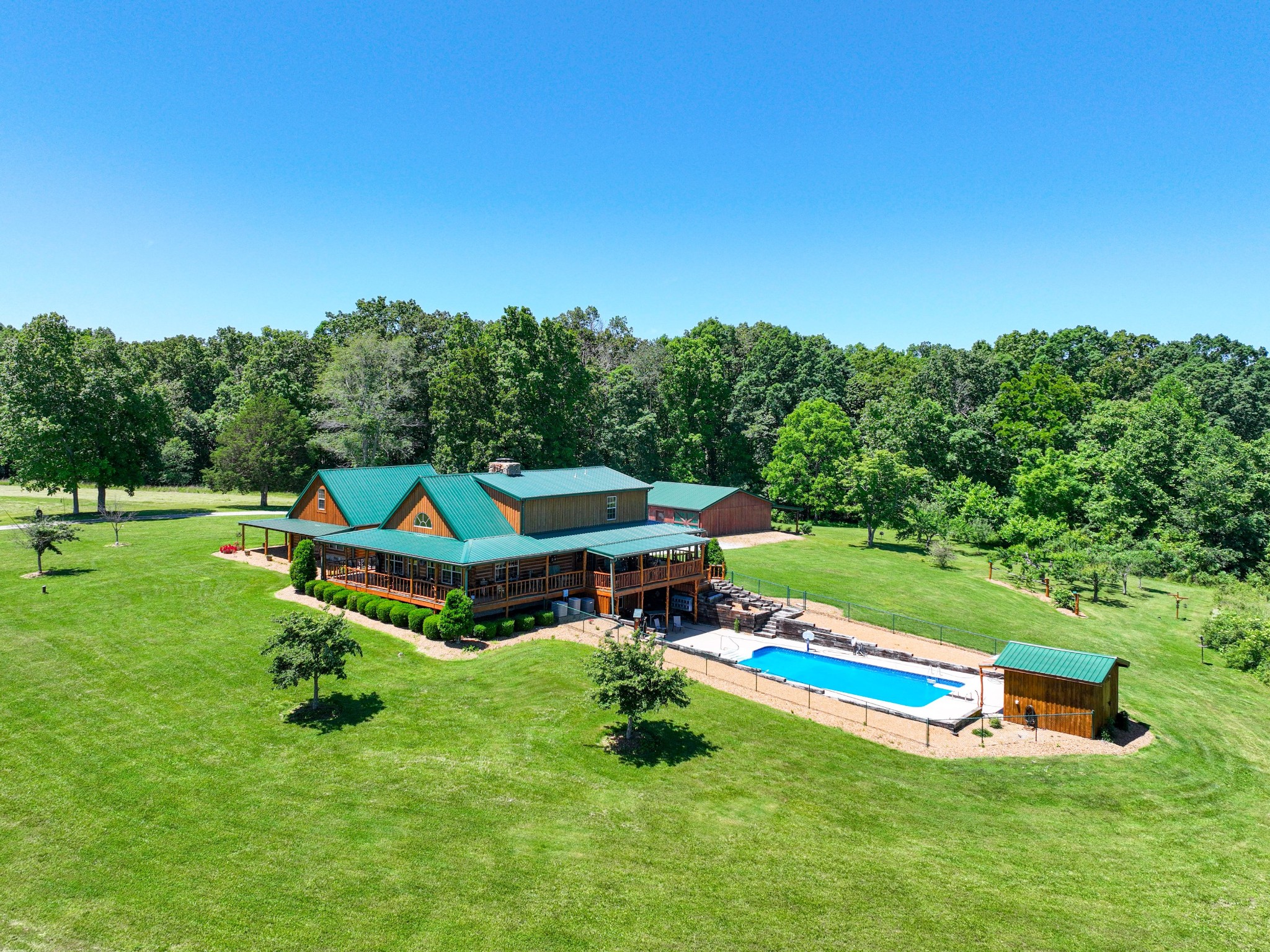 375 Good Hope Road Leoma, TN 38468 - Photo 1 of 23 a small garden with wooden fence