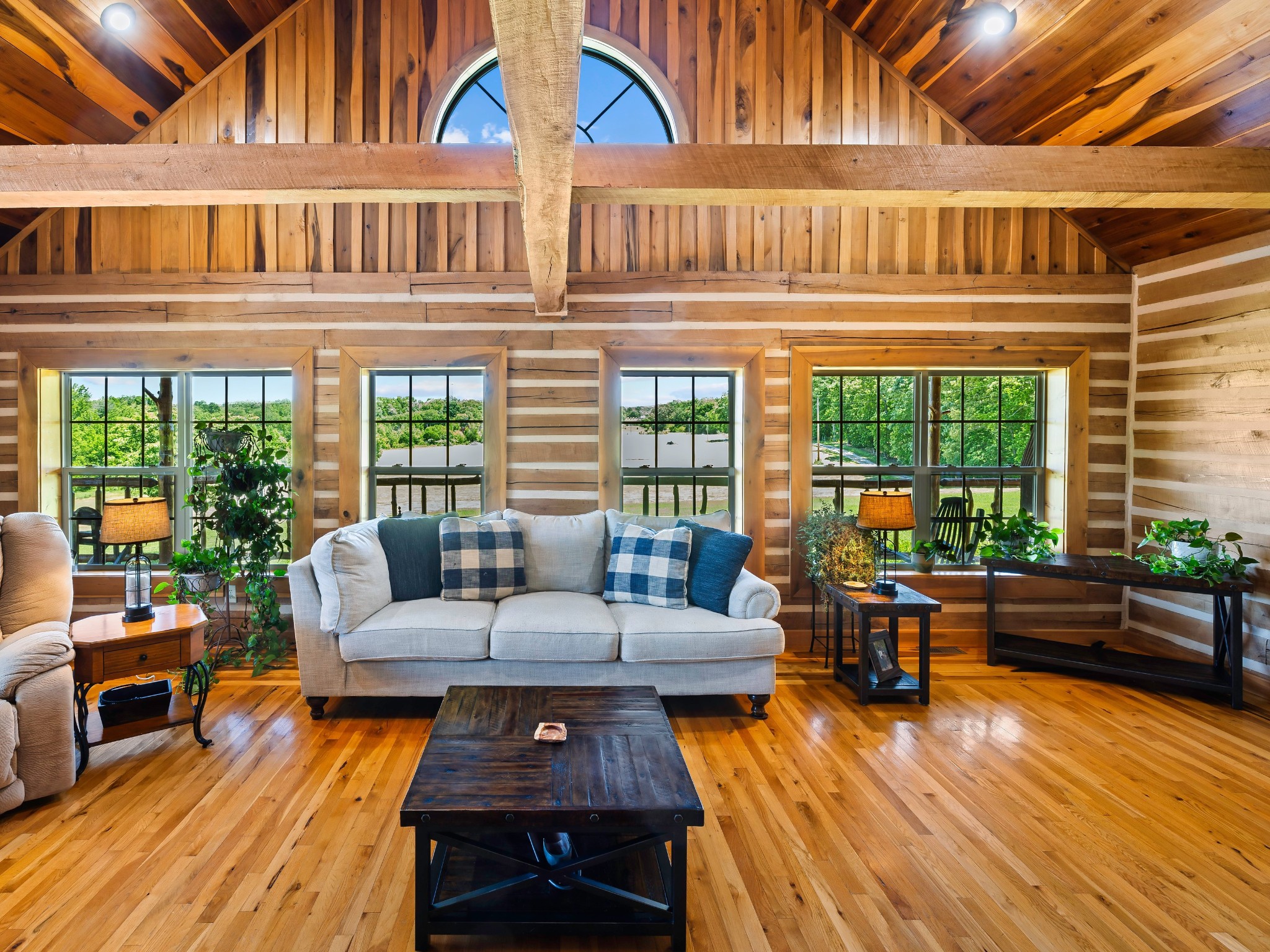 375 Good Hope Road Leoma, TN 38468 - Photo 11 of 23 a outdoor living space with patio furniture and a wooden floor