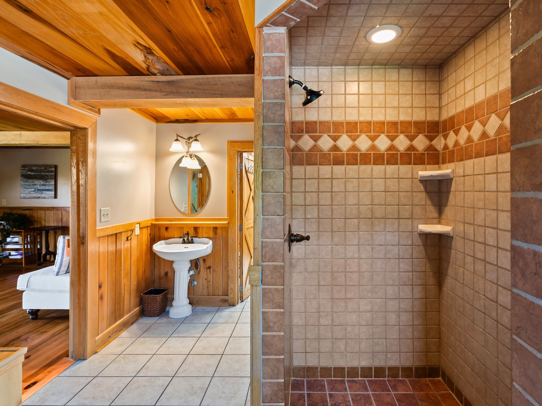375 Good Hope Road Leoma, TN 38468 - Photo 16 of 23 a bathroom with a sink a toilet and shower