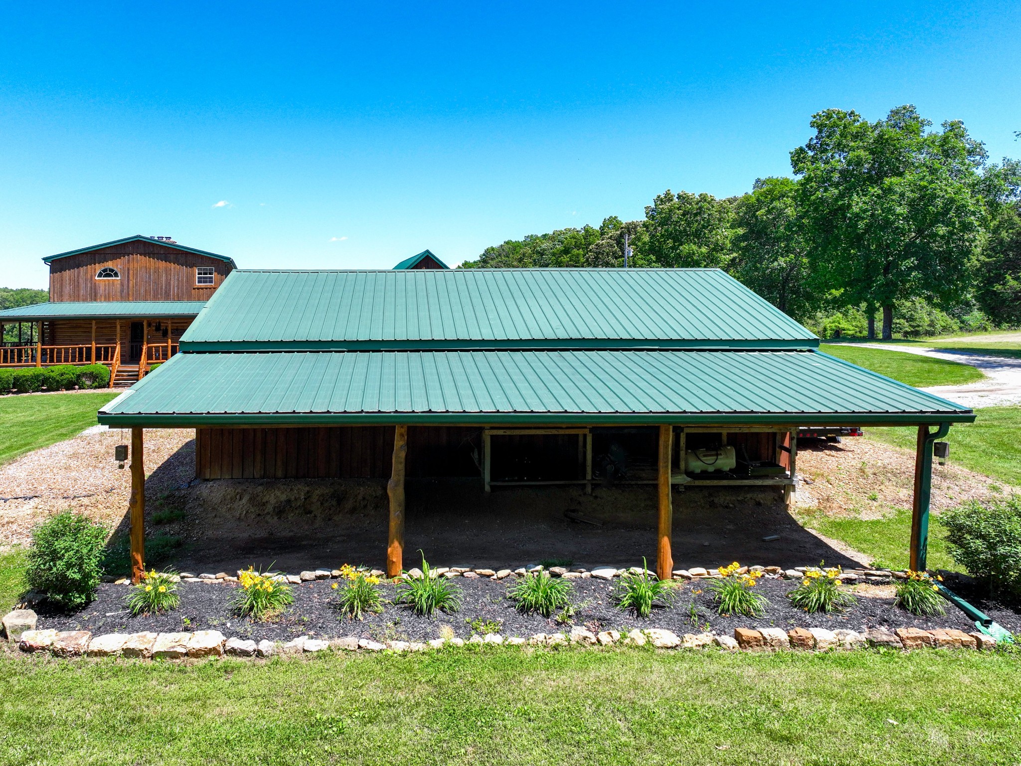 375 Good Hope Road Leoma, TN 38468 - Photo 22 of 23 a front view of a house with a garden