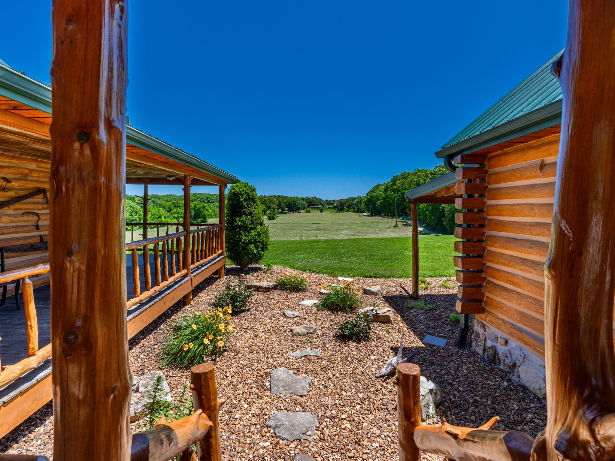 375 Good Hope Road Leoma, TN 38468 - Photo 10 of 23 a view of a backyard with a garden