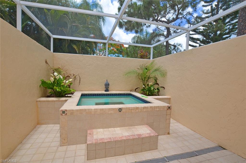 264 Henley Drive Naples, FL 34104 - Photo 16 of 25 a sink with view of potted plants